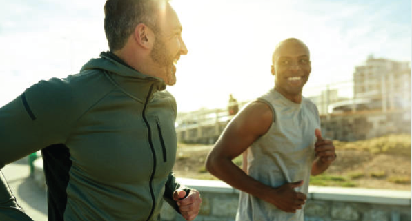 Two men running outdoors