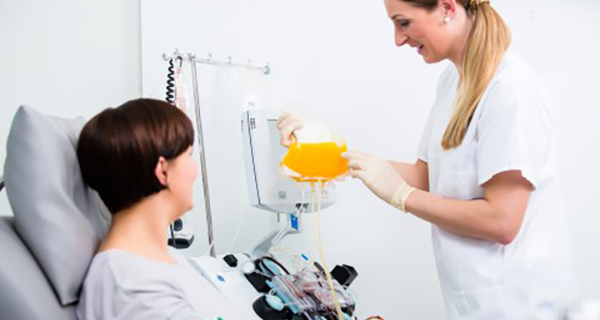 Patient with nurse in hospital