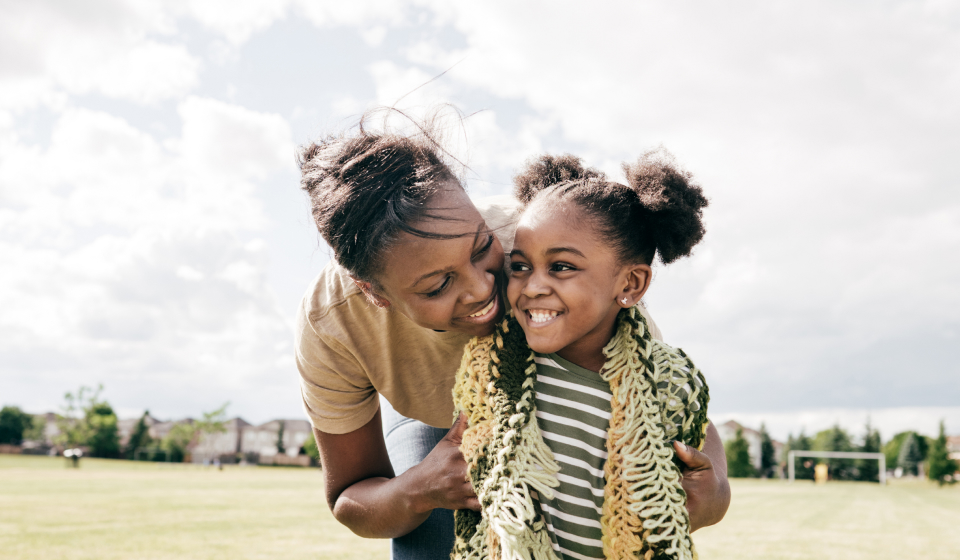 Mom and daughter embracing