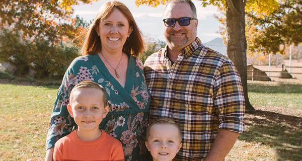 Dan and family outside in a yard