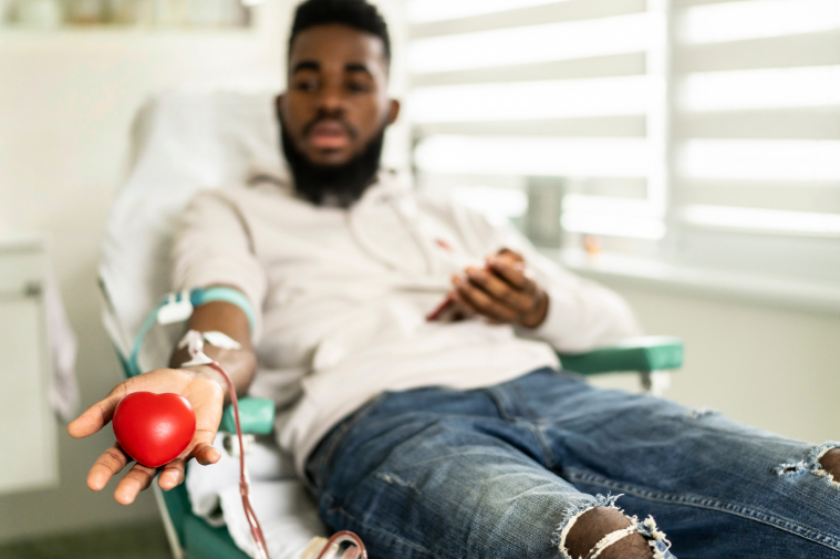 Donor giving blood